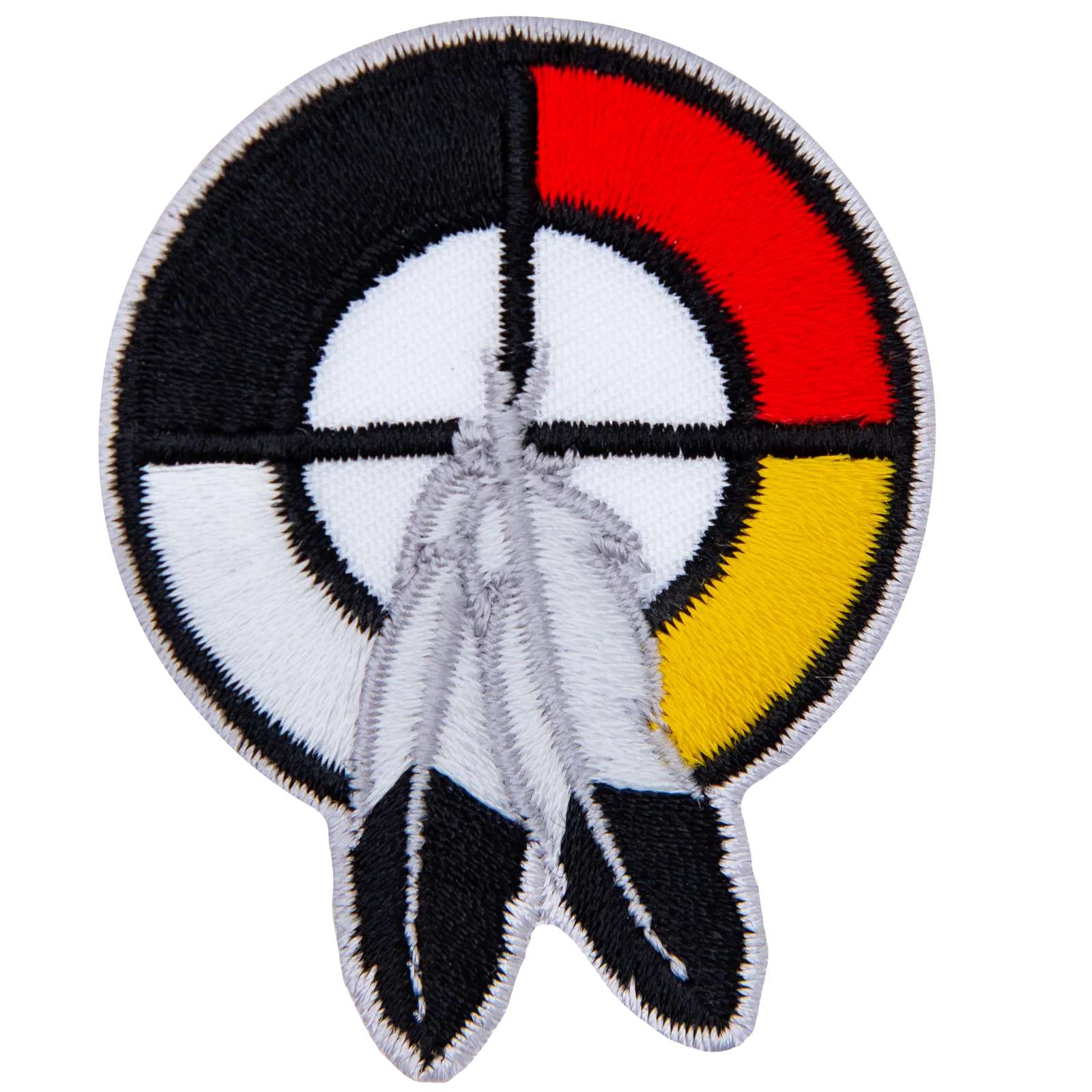 A healing circle with two feathers on it.